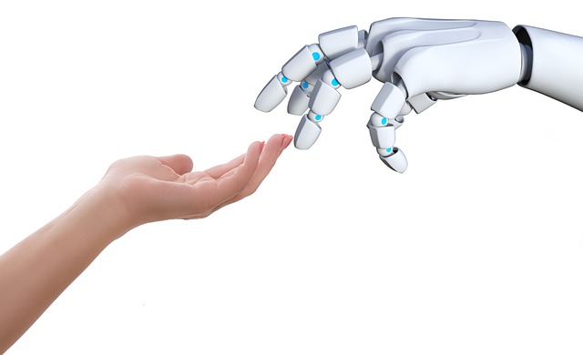 mano humana con mano de robot